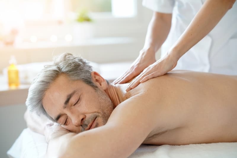 Close-up of a deep tissue back and shoulder massage.